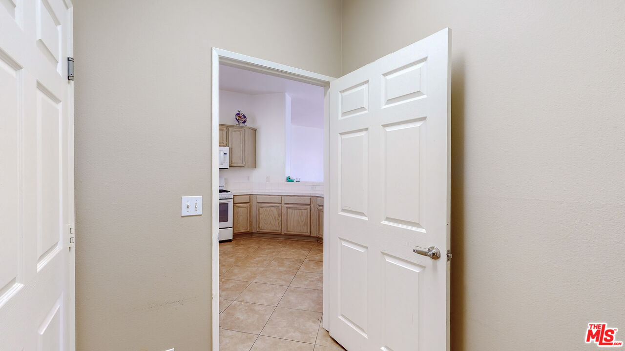 68606 La Medera Road Cathedral City, CA 92234 - Photo 27 of 33 a bathroom with a sink a mirror and a toilet