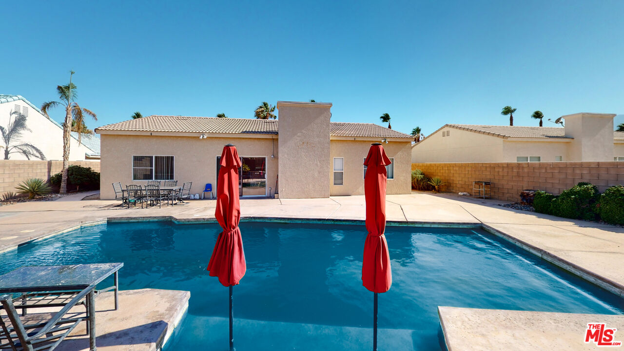 68606 La Medera Road Cathedral City, CA 92234 - Photo 30 of 33 a front view of a house with swimming pool