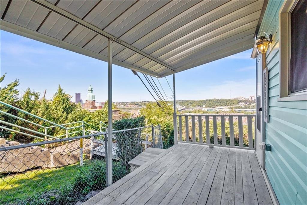 39 Eleanor Street Pittsburgh, PA 15203 - Photo 2 of 25 a view of a balcony with wooden floor