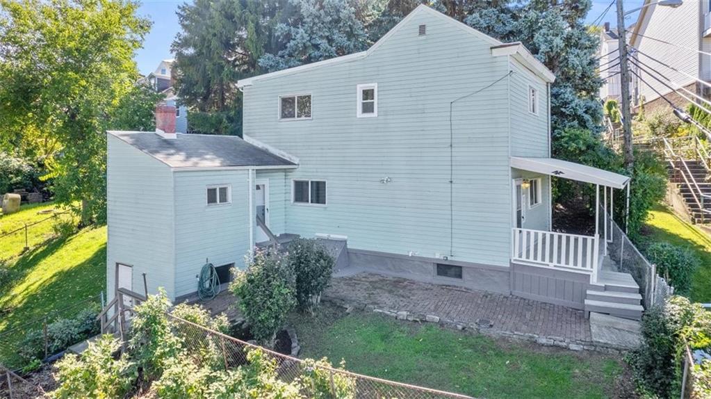 39 Eleanor Street Pittsburgh, PA 15203 - Photo 4 of 25 a front view of a house with garden
