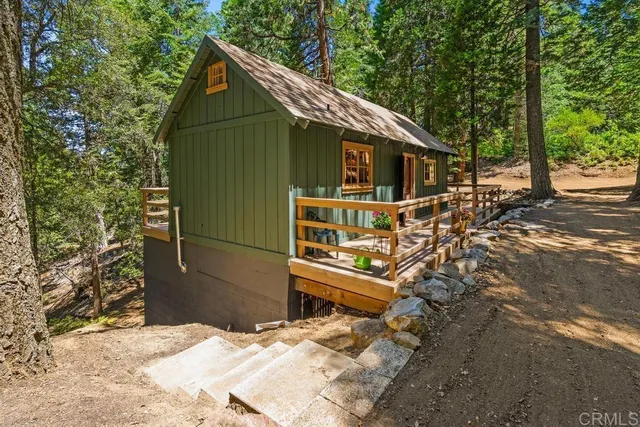 a house with trees in front of it