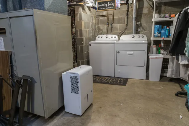 a utility room with dryer and washer