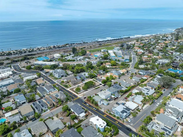 a view of a city with ocean view