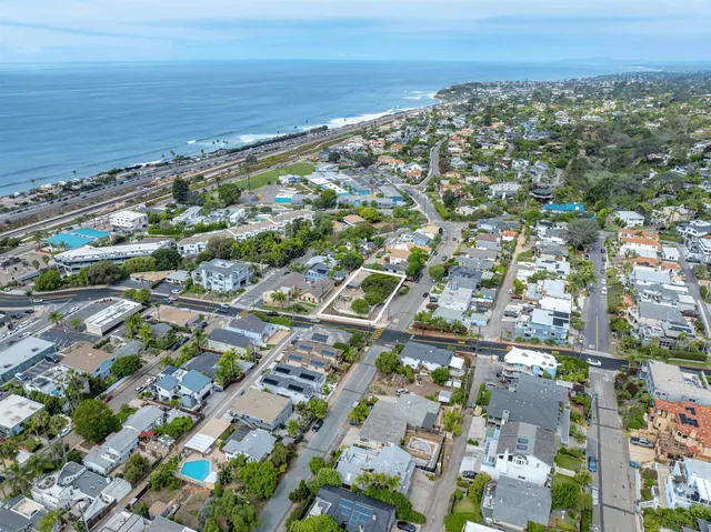 a view of a city with ocean view