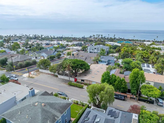 an aerial view of a city with lots of residential buildings