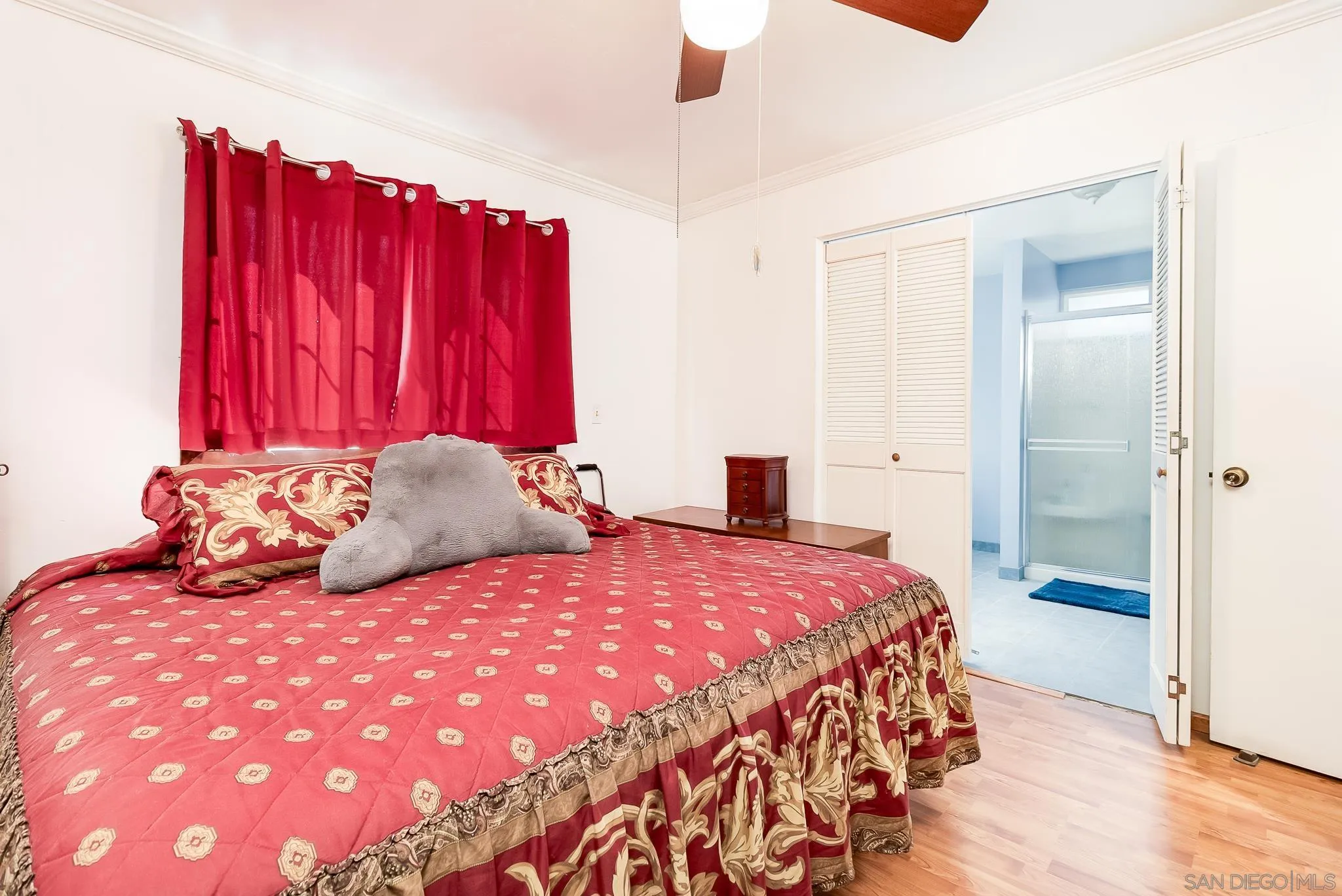 8423 Prospect Avenue Santee, CA 92071 - Photo 13 of 30 a bedroom with a bed and a closet