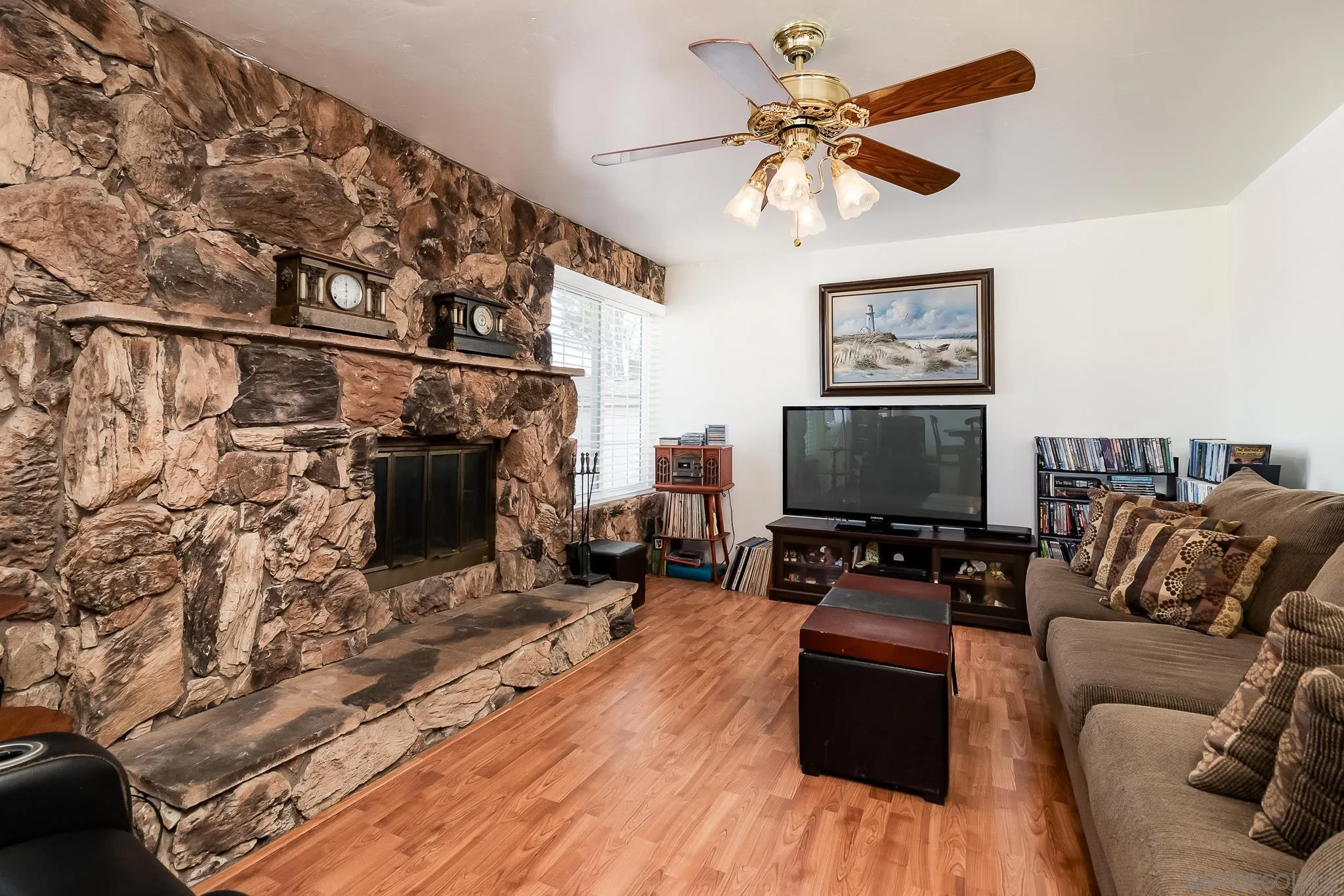 8423 Prospect Avenue Santee, CA 92071 - Photo 3 of 30 a living room with furniture and a flat screen tv