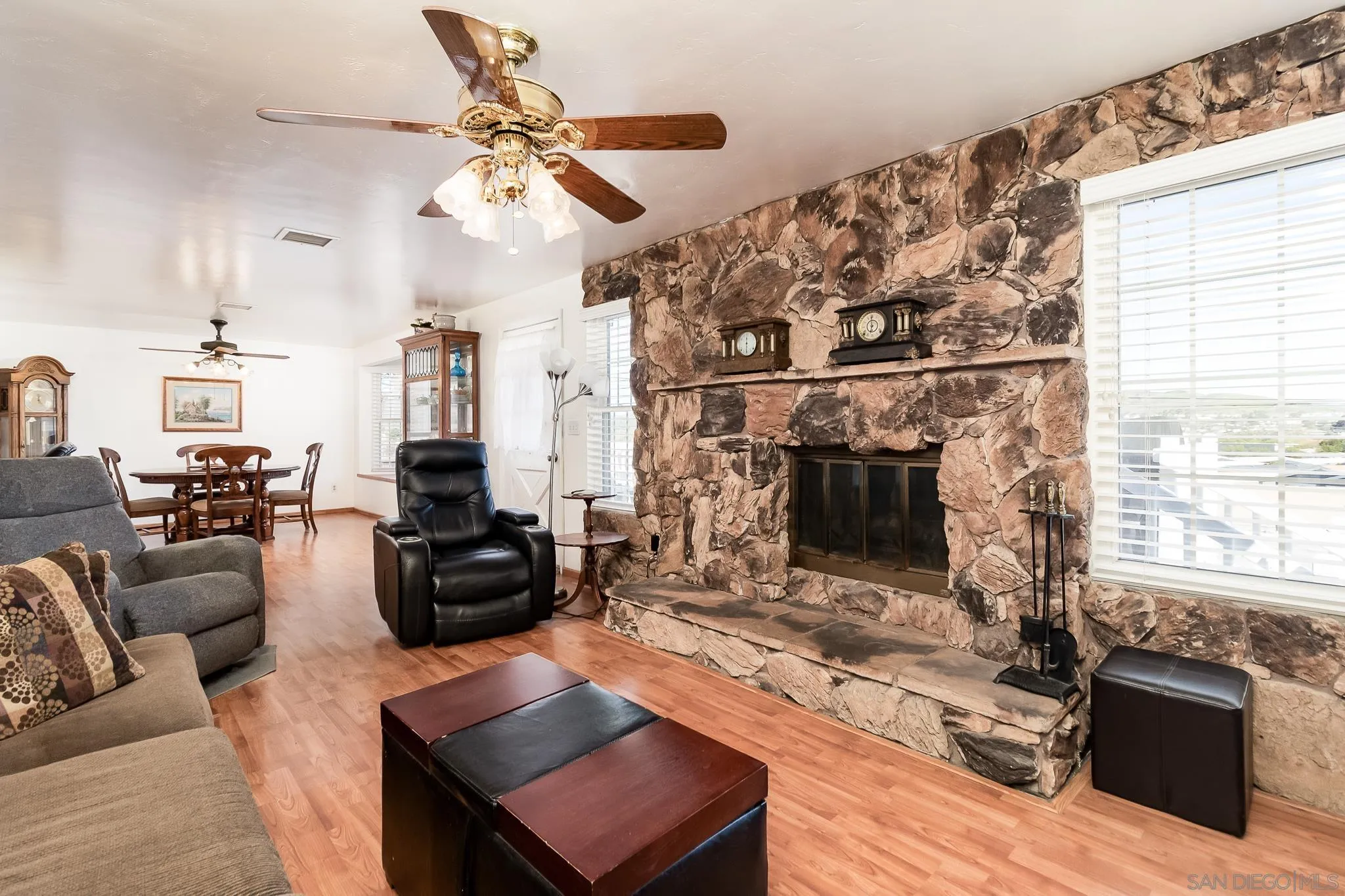 8423 Prospect Avenue Santee, CA 92071 - Photo 5 of 30 a living room with furniture and a fireplace