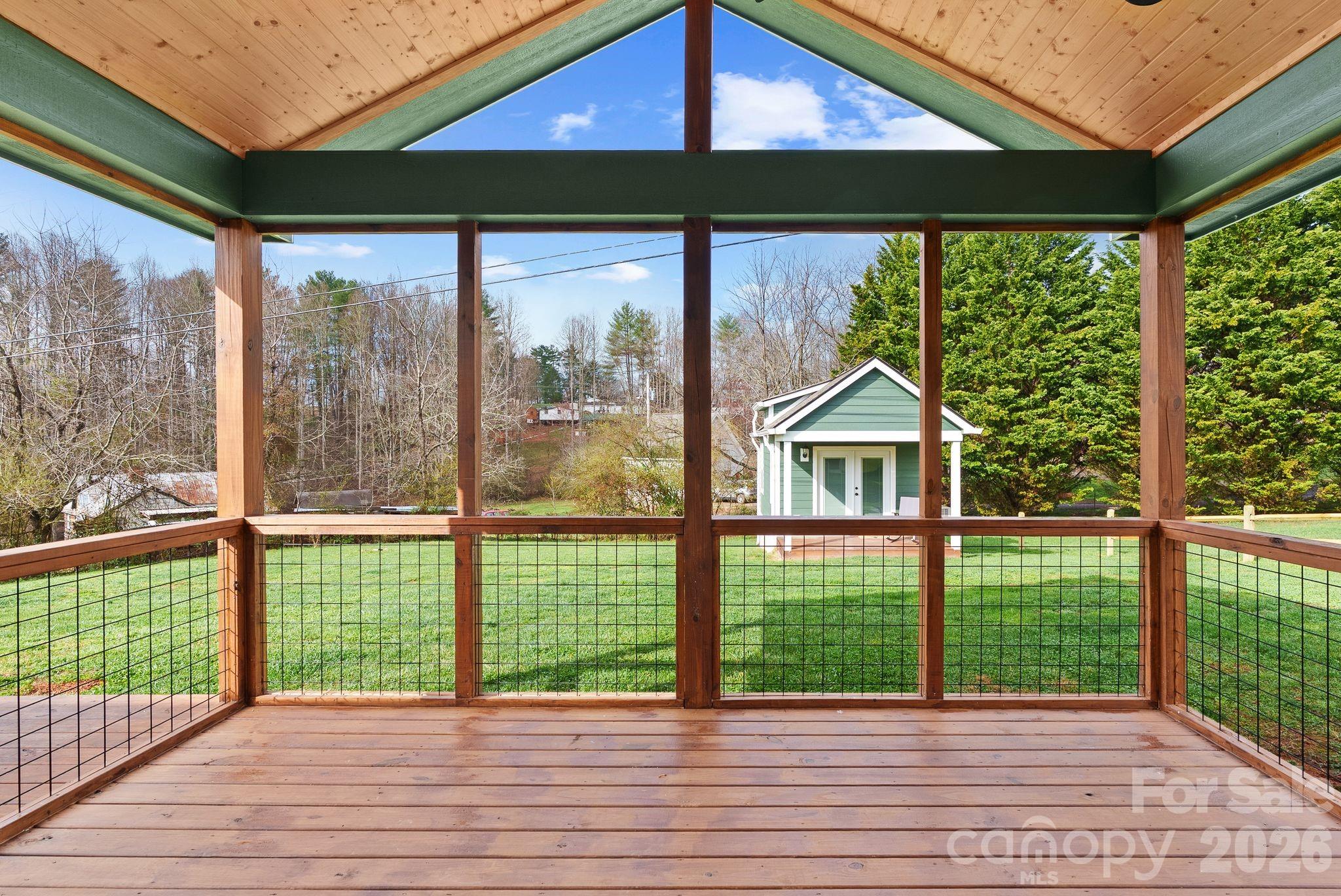 209 Breton Ridge Road Leicester, NC 28748 - Photo 18 of 34 a view of a house with a porch