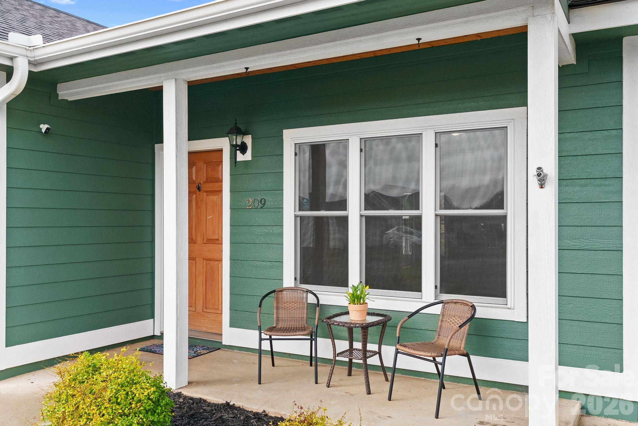 209 Breton Ridge Road Leicester, NC 28748 - Photo 2 of 34 a view of an outdoor space with seating area