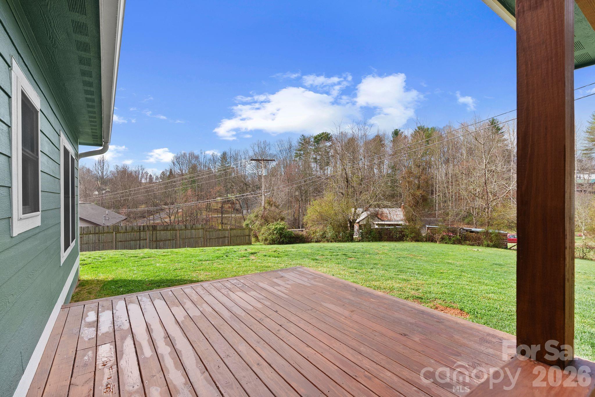 209 Breton Ridge Road Leicester, NC 28748 - Photo 23 of 34 a view of a yard with an outdoor space
