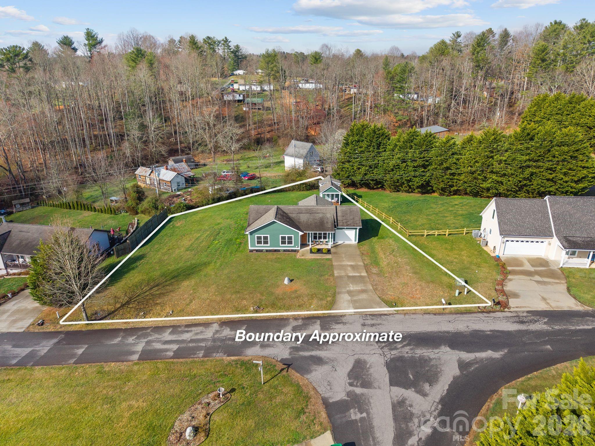 209 Breton Ridge Road Leicester, NC 28748 - Photo 27 of 34 a view of a tennis court
