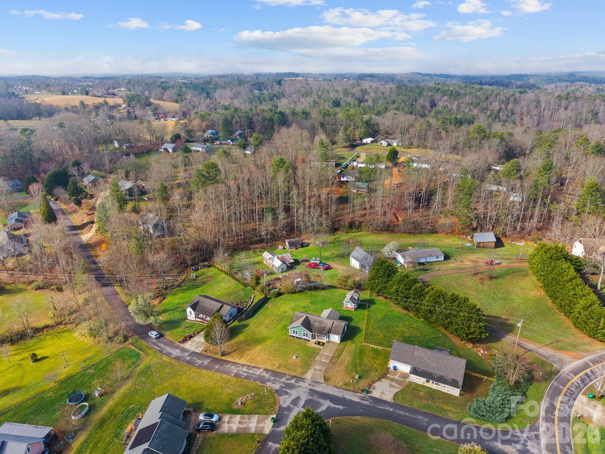 209 Breton Ridge Road Leicester, NC 28748 - Photo 31 of 34 an aerial view of residential houses with outdoor space