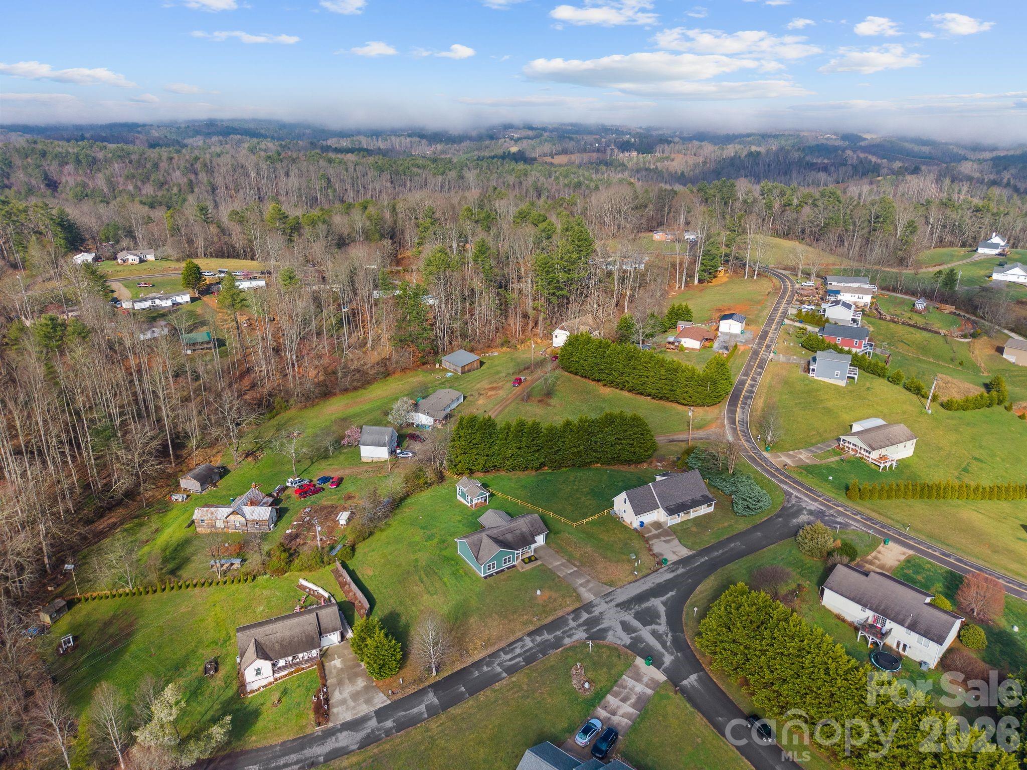 209 Breton Ridge Road Leicester, NC 28748 - Photo 32 of 34 an aerial view of lake residential houses with outdoor space