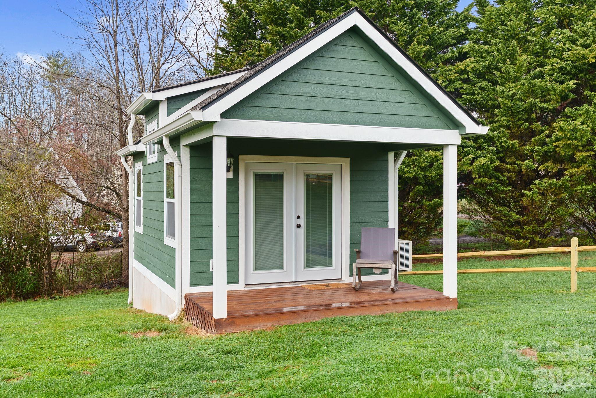 209 Breton Ridge Road Leicester, NC 28748 - Photo 5 of 34 a view of a house with backyard