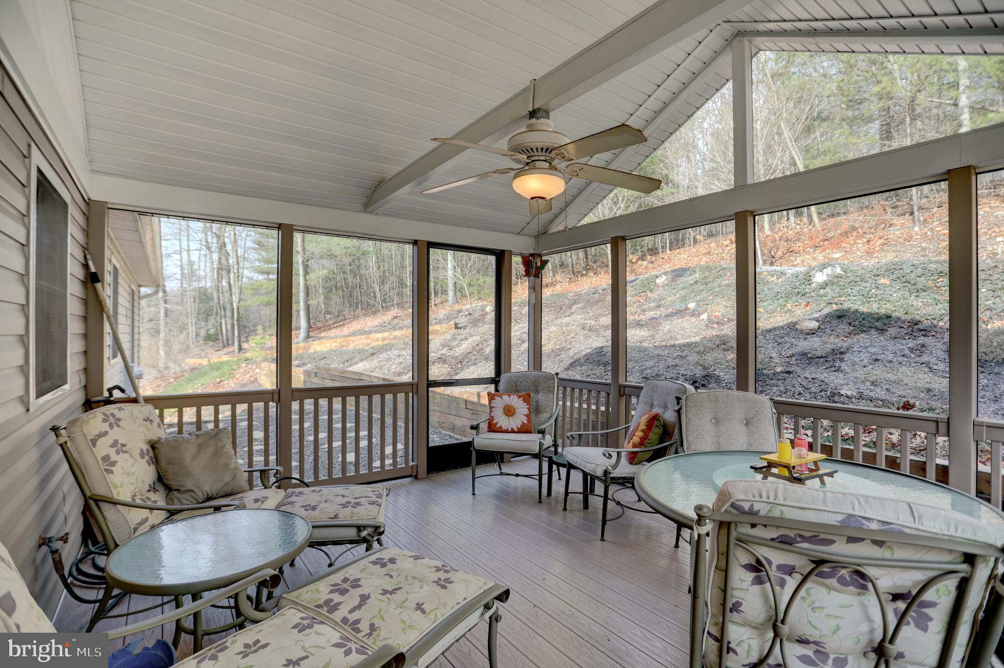 137 Rambo Hill Road Shermans Dale, PA 17090 - Photo 29 of 43 ENCLOSED SCREENED PORCH