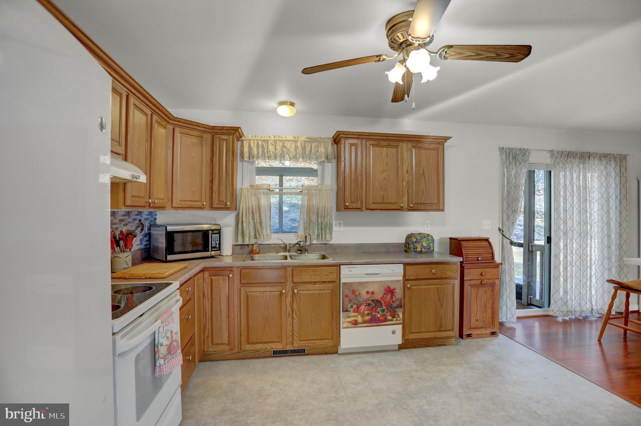 137 Rambo Hill Road Shermans Dale, PA 17090 - Photo 4 of 43 New Plank flooring in kitchen
