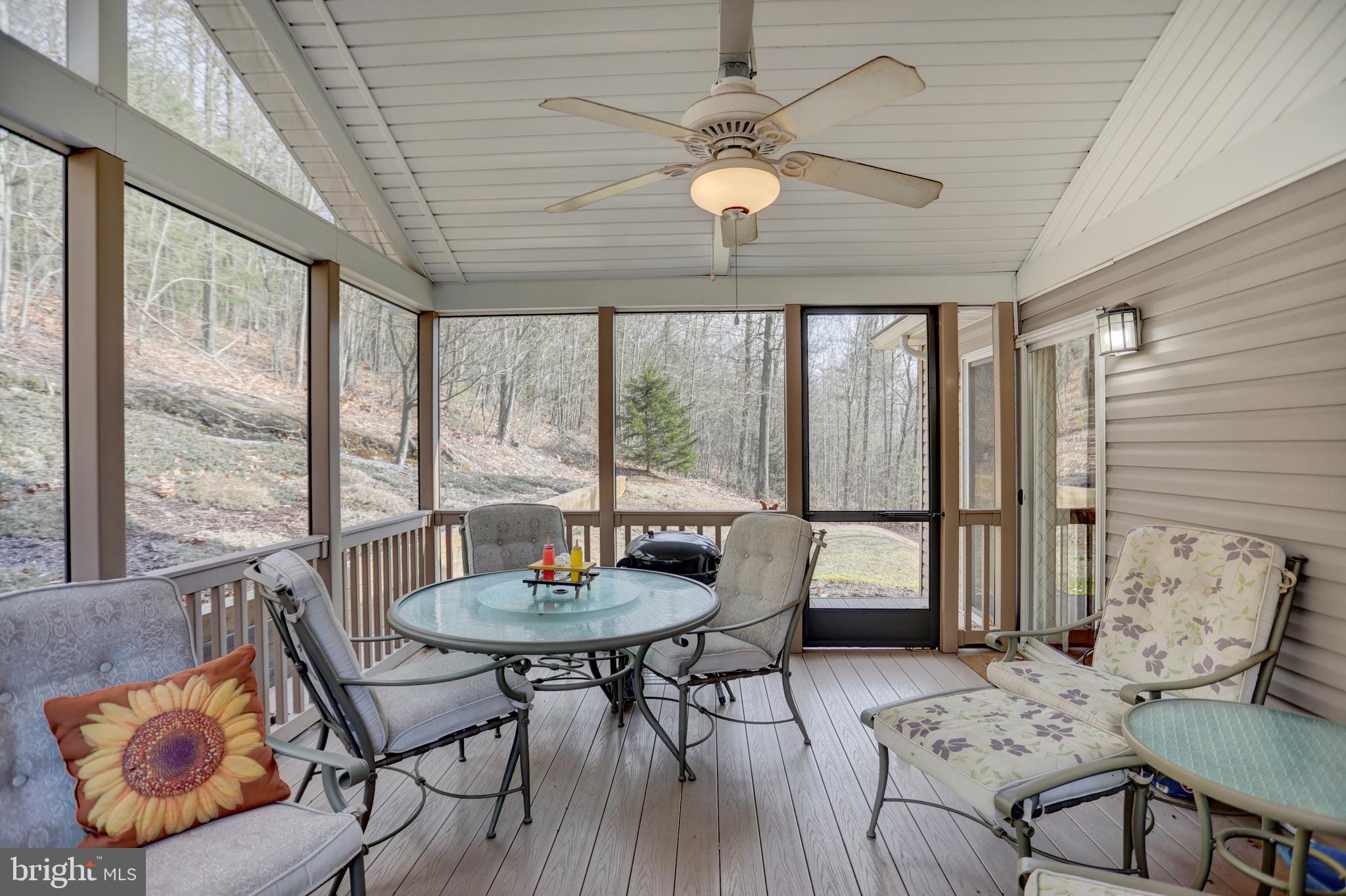 137 Rambo Hill Road Shermans Dale, PA 17090 - Photo 31 of 43 ENCLOSED SCREENED PORCH