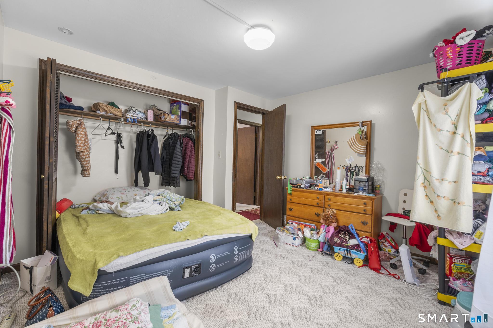 133 Stevenson Road Meriden, CT 06451 - Photo 20 of 30 a room with furniture and a couch