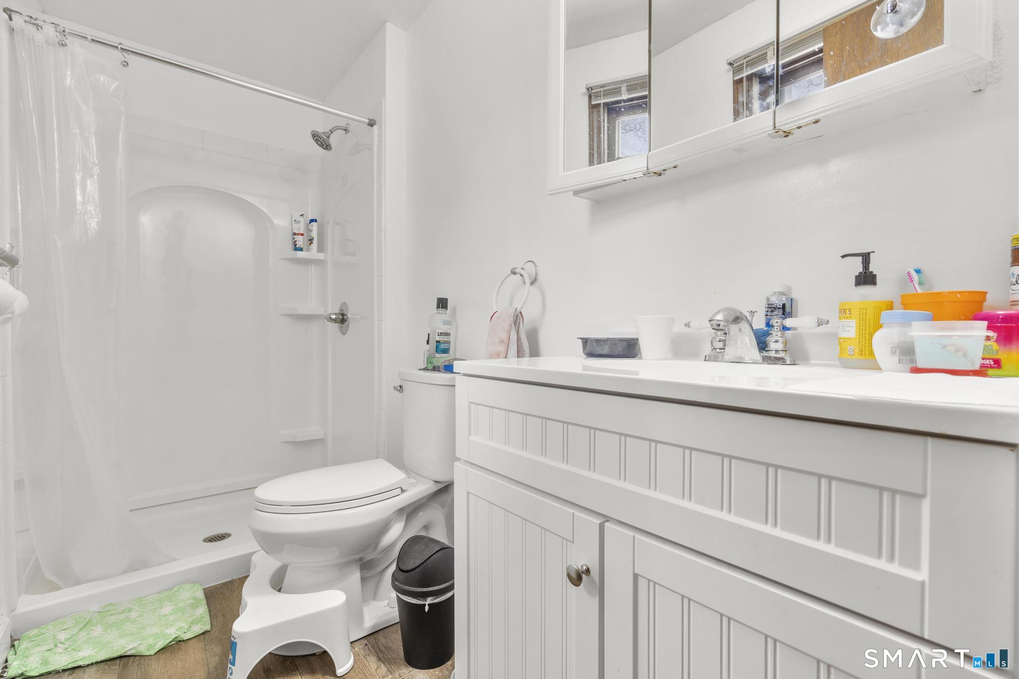 133 Stevenson Road Meriden, CT 06451 - Photo 26 of 30 a bathroom with a sink toilet and shower