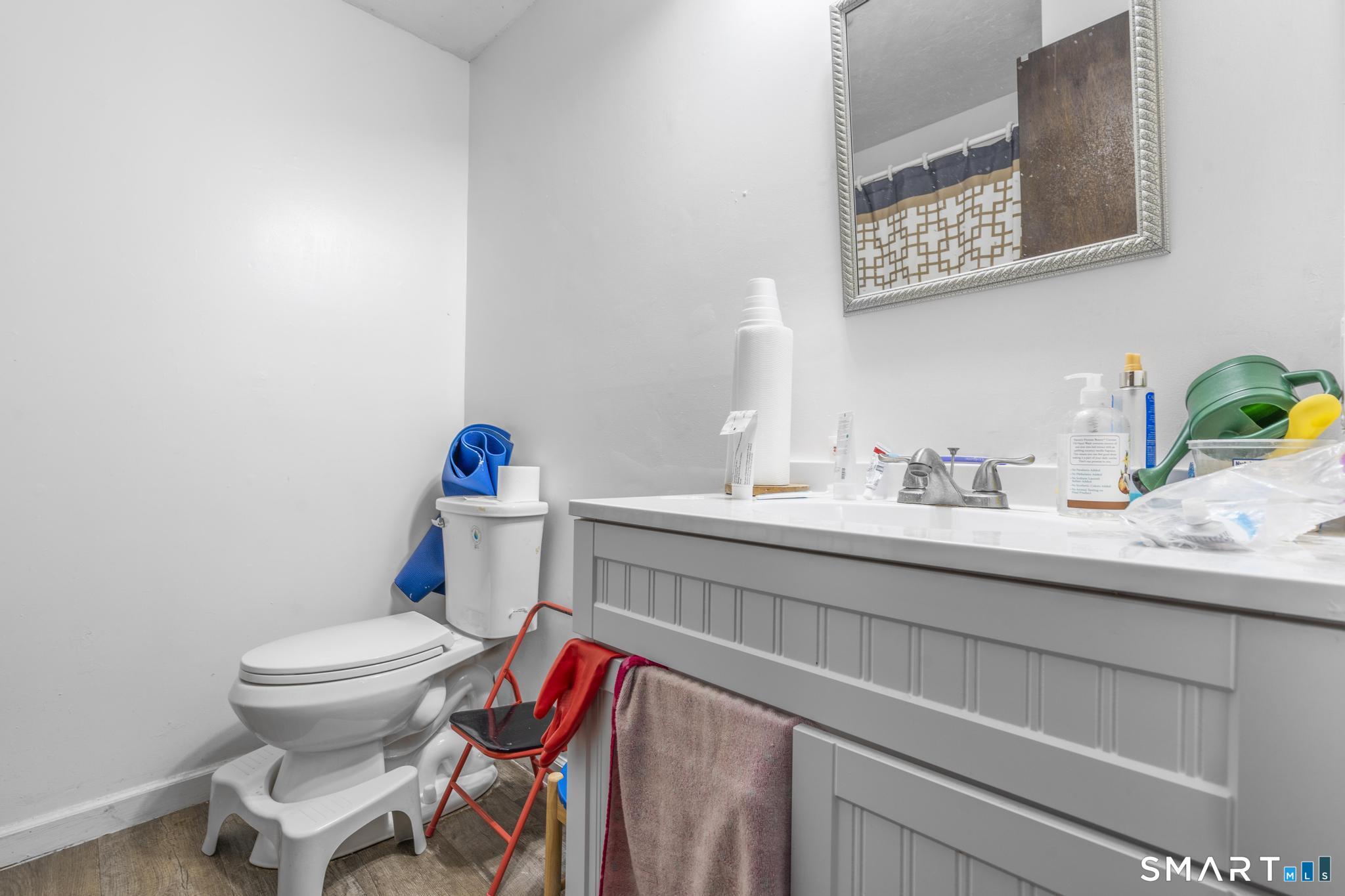133 Stevenson Road Meriden, CT 06451 - Photo 28 of 30 a bathroom with a sink and a toilet