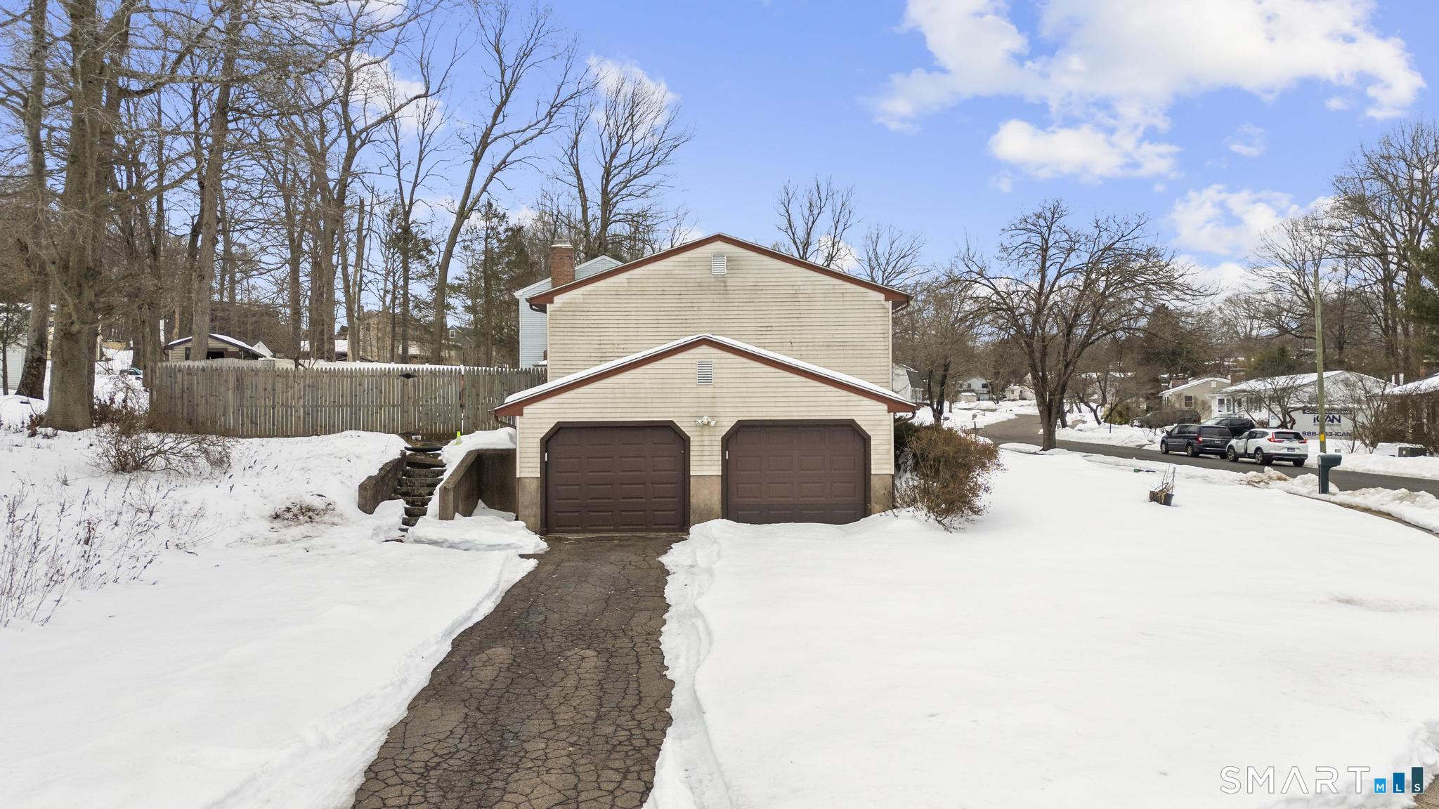 133 Stevenson Road Meriden, CT 06451 - Photo 3 of 30 a view of a backyard with snow