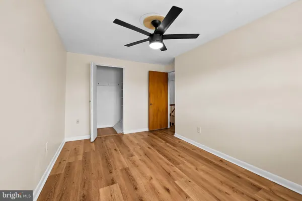 a view of a big room with wooden floor