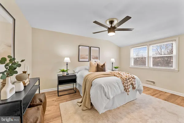a bed room with a bed and a window