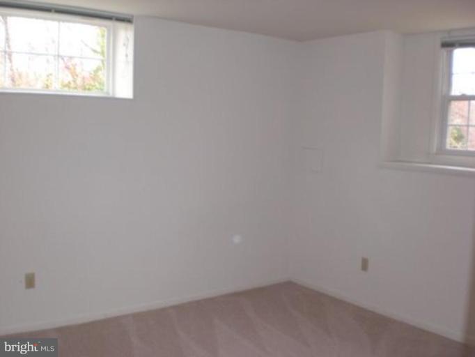 7817 Leland Road Manassas, VA 20111 - Photo 16 of 22 Rec Rm has light w/ walk up stairs to back yard