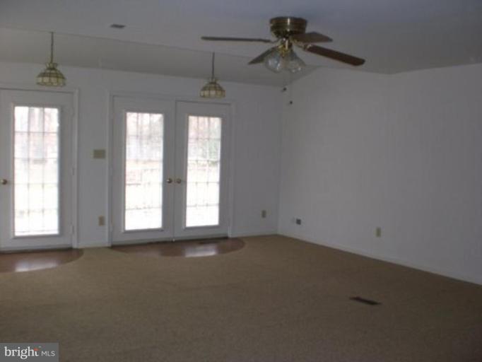 7817 Leland Road Manassas, VA 20111 - Photo 7 of 22 Family Rm w/ double french doors leading to deck