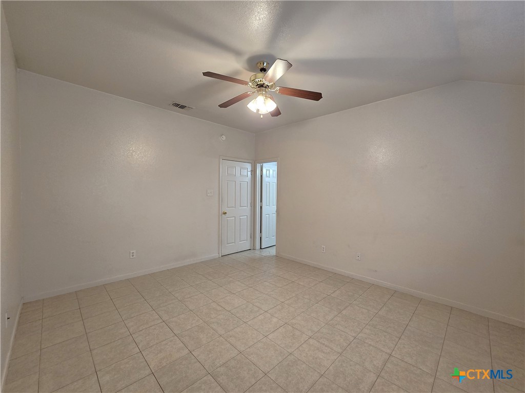1411 Nicholas Circle, Unit B Killeen, TX 76542 - Photo 13 of 23 wooden floor in an empty room