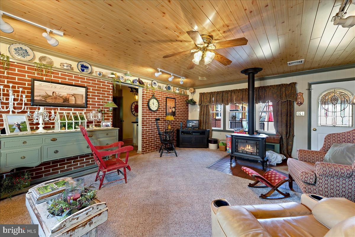 592 Nottingham Road Peach Bottom, PA 17563 - Photo 11 of 28 Family Room- Propane Stove
