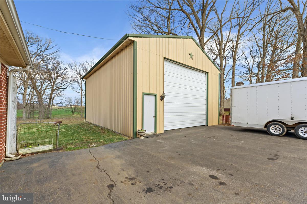 592 Nottingham Road Peach Bottom, PA 17563 - Photo 22 of 28 Large garage- Oversized Door