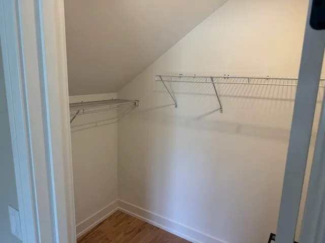 a view of a room with racks on the wall