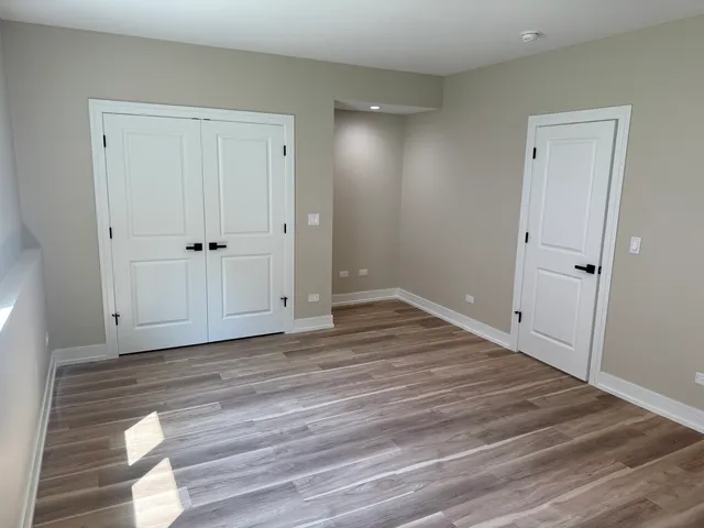 a view of a livingroom with wooden floor