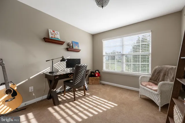 a bed room with a bed and a television