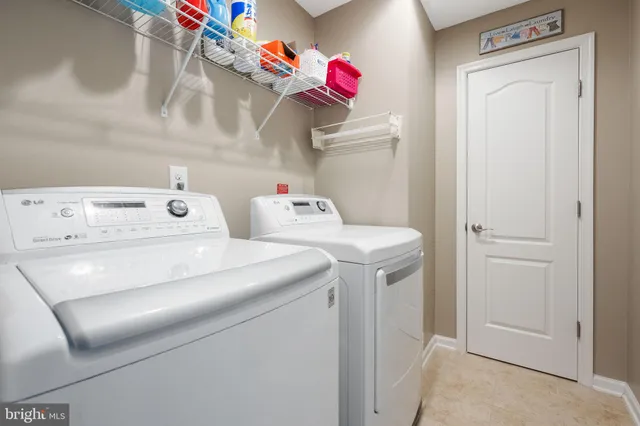 a terrace of a house with wooden floor and outdoor seating