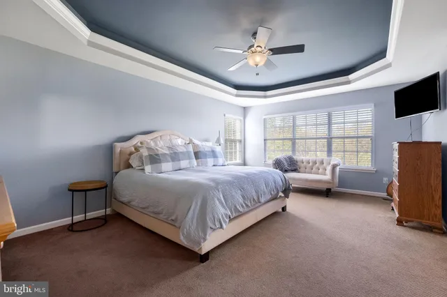 a view of balcony and with potted plants and wooden floor