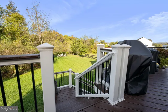 a living room with furniture and white walls
