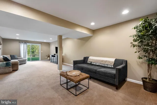 a view of a chair and table in the garden
