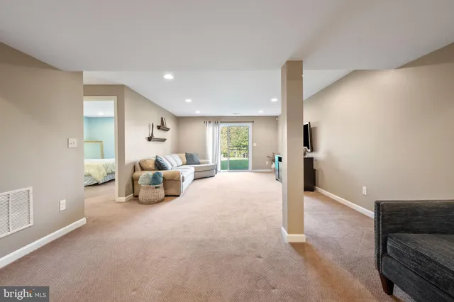 a view of a chairs and table in the patio