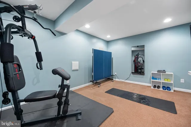 a view of a chair and table on the garden