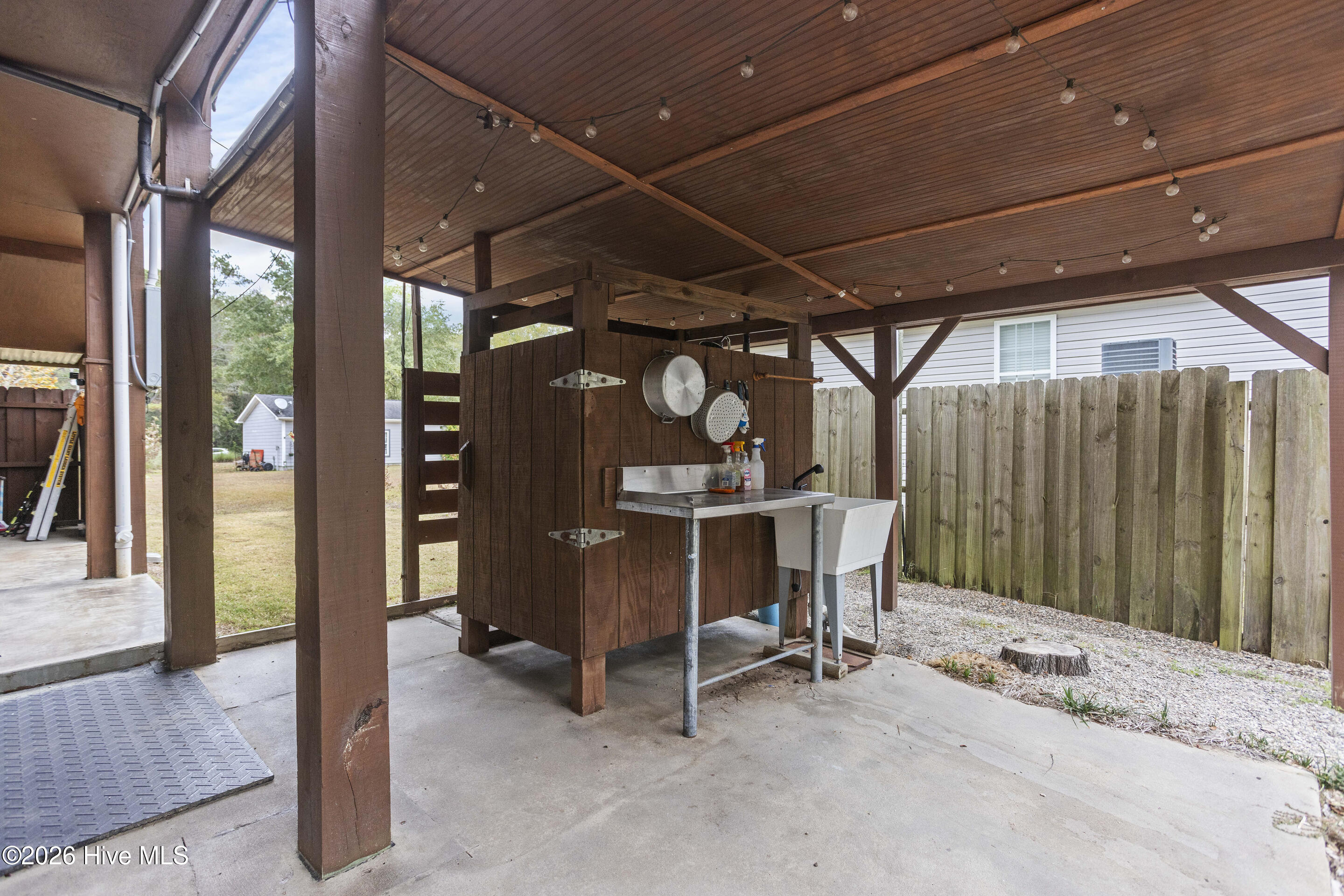 229 Estate Road Atkinson, NC 28421 - Photo 29 of 79 H/C outdoor shower