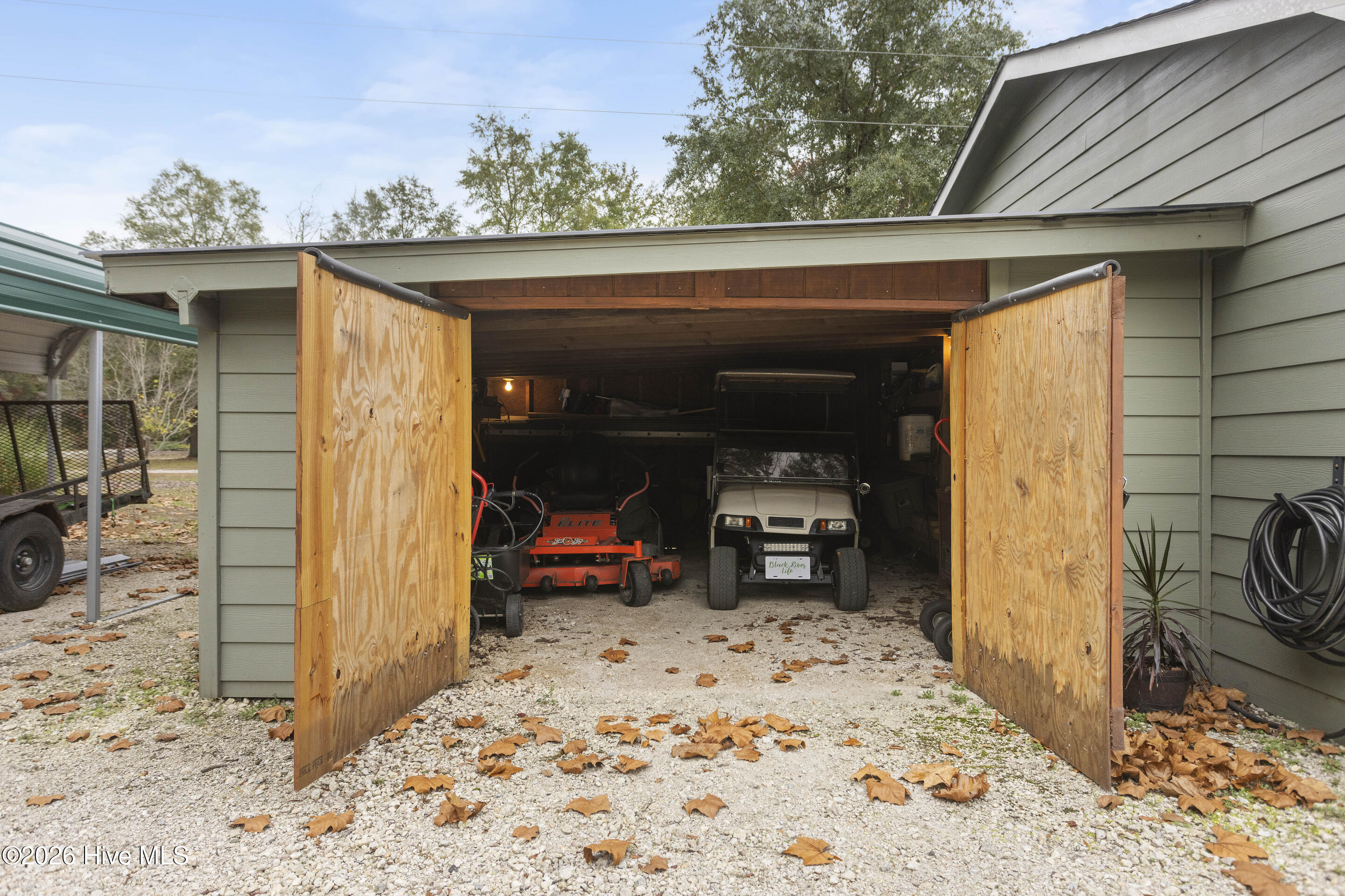 229 Estate Road Atkinson, NC 28421 - Photo 79 of 79 Golf Cart and mower storage