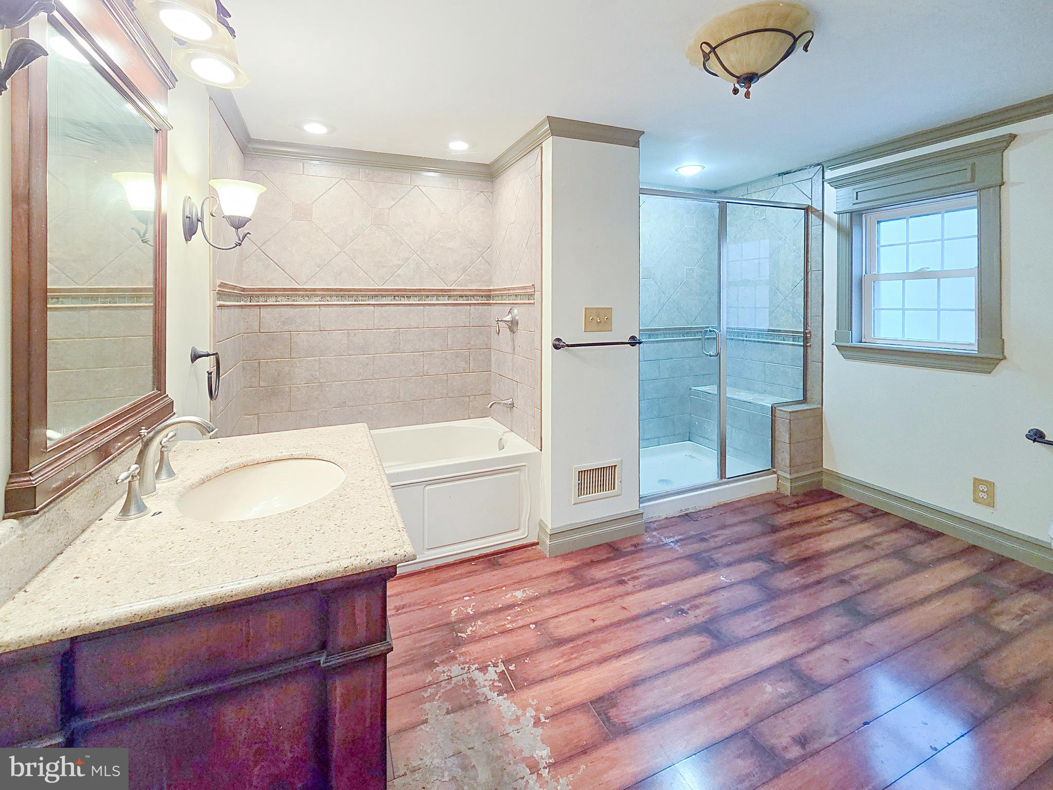 31 Diverty Road Pennington, NJ 08534 - Photo 11 of 29 a bathroom with a sink and a shower