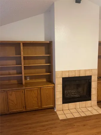 a view of wooden floor in an empty room