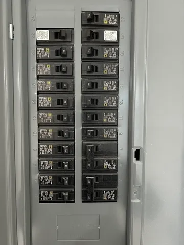 a view of walk in closet with glass windows