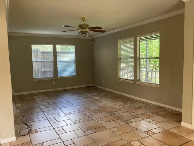 a view of an empty room and window
