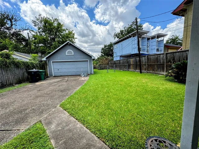 a house view with a garden space