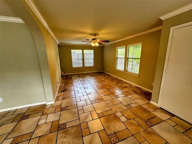 a view of an empty room and window